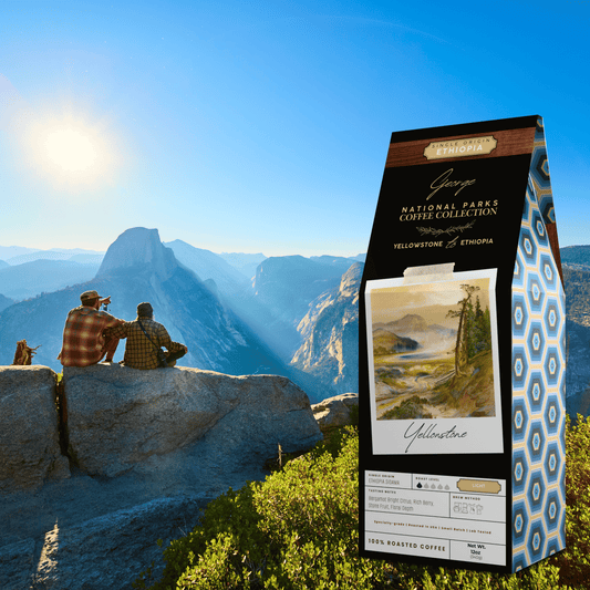 Single-origin specialty coffee from Ethiopia Sidama in collectible GEORGE National Parks Collection packaging by Official Fellow Citizen. Yellowstone mountain scene in background.