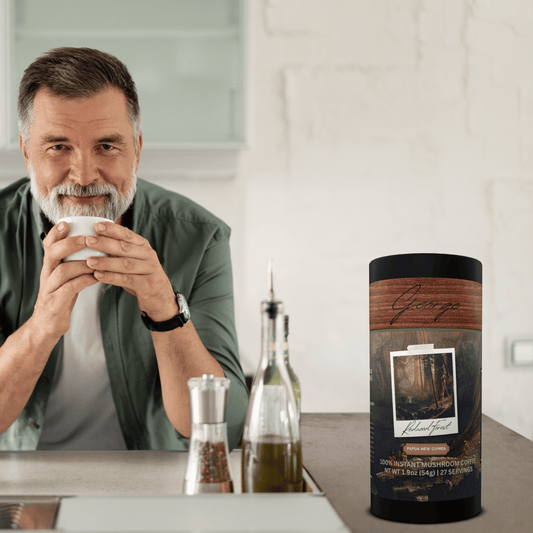 Mushroom coffee with lion’s mane and chaga from Papua New Guinea in collectible GEORGE National Parks Collection tube packaging by Official Fellow Citizen. Man holding cup of mushroom coffee. - Certified by Mintall.