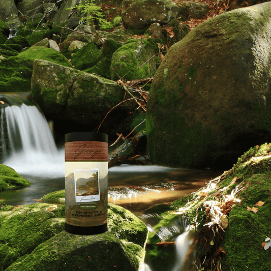 Specialty instant coffee from Papua New Guinea in collectible GEORGE National Parks Collection tube packaging by Official Fellow Citizen. Nature scene.